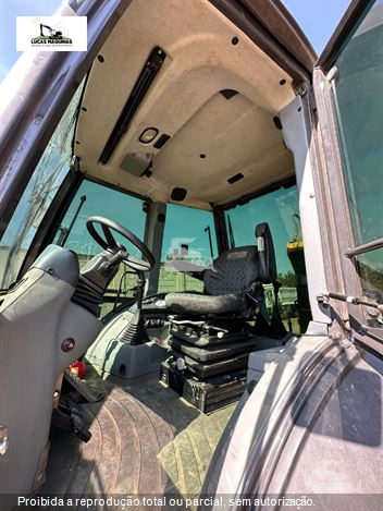 Retro Escavadeira New Holland B110B