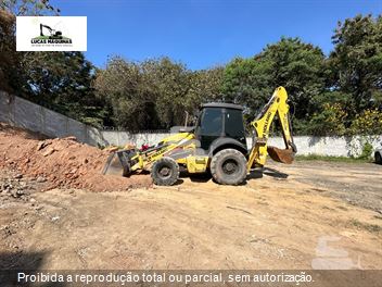 Retro Escavadeira New Holland B110B